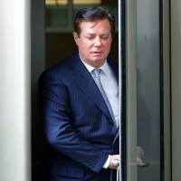 Paul Manafort leaves the federal courthouse in Washington in February. The trial of President Donald Trump\'s former campaign chairman will open this week with tales of lavish spending on properties and clothing and allegations that the political consultant laundered money through offshore bank accounts. What\'s likely to be missing: answers about whether the Trump campaign colluded with Russia during the 2016 presidential election. | AP