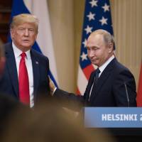 U.S. President Donald Trump (left) and Vladimir Putin, Russia\'s president, prepare to leave following a news conference in Helsinki on Monday. Trump called special counsel Robert Mueller\'s probe into Russian election meddling a \"disaster\" on Monday, again questioned whether Russia interfered in the 2016 election that he won. | BLOOMBERG