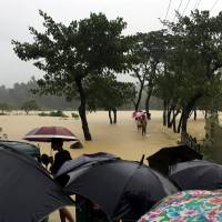 A road is flooded after heavy rain in Cox\'s Bazar, Bangladesh, July 25. | REUTERS