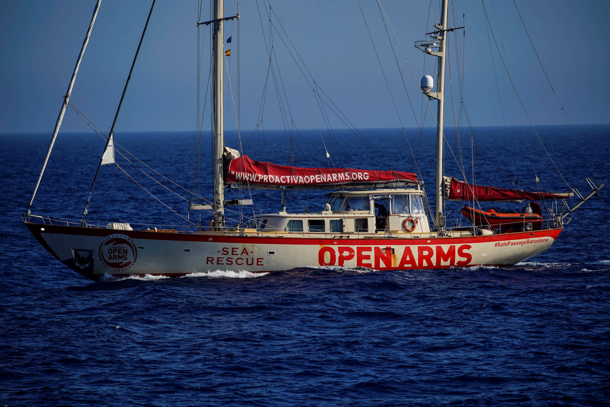 NGO Proactiva Open Arms rescue boat the Astral sails to Spain in central Mediterranean Sea Wednesday. | REUTERS