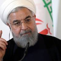 Iranian President Hassan Rouhani attends a news conference at the Chancellery in Vienna on July 4. | REUTERS
