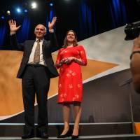Liberal Democrat deputy leader Jo Swinson stands beside party leader Vince Cable after he delivered the keynote speech at the party\'s annual conference in Bournemouth, England, on Sept. 19. | BLOOMBERG