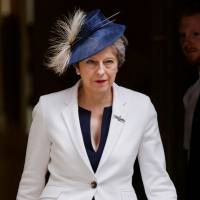 British Prime Minister Theresa May leaves No. 10 Downing Street on Tuesday. | BLOOMBERG
