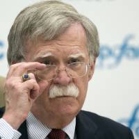 U.S. National security adviser John Bolton listens to question as he speaks to the media after his talks with Russian President Vladimir Putin in Moscow June 27. | AP