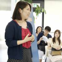 High school student Yoko Aoki pitches her business idea at a youth social entrepreneurship contest last month in Shibuya Ward, Tokyo. | CHISATO TANAKA