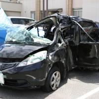 Koharu Abe, a 13-year-old junior high school student, was killed when this car crashed around 4:55 a.m. Sunday in the city of Okayama. Four other junior school students in the same vehicle were also injured. Police are investigating who of the five was driving. | KYODO