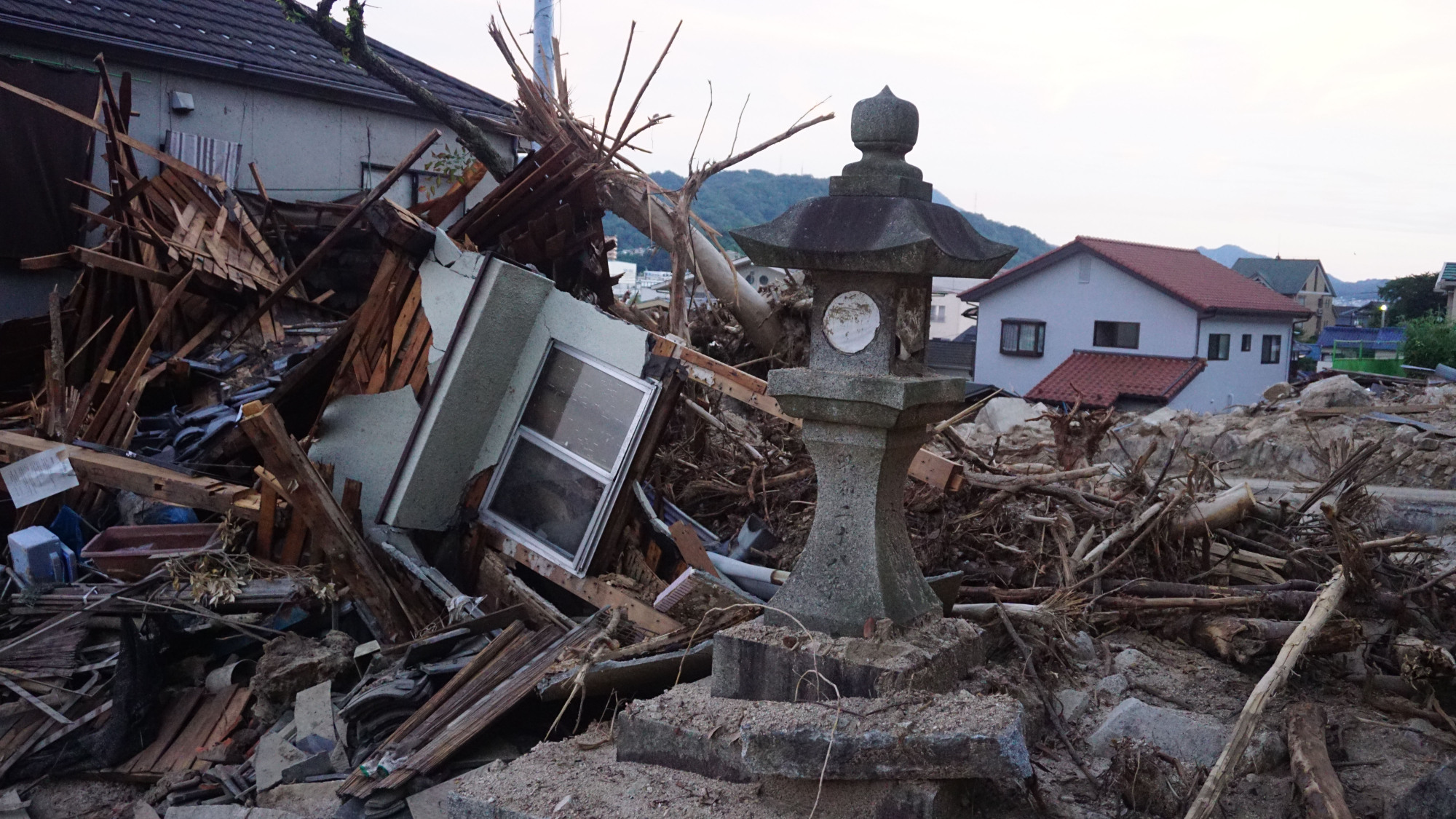 The town of Kaita, next to Hiroshima and home to a large Brazilian community, is seen Saturday after torrential rains and landslides hit earlier this month. | MAGDALENA OSUMI