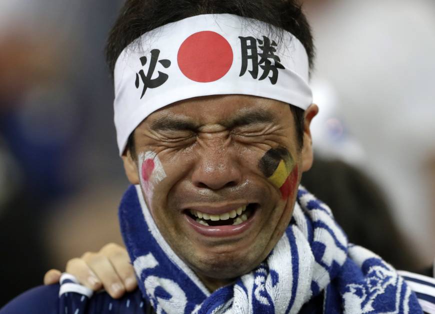 A Japan supporter is no longer able to hold back emotion, after the national team