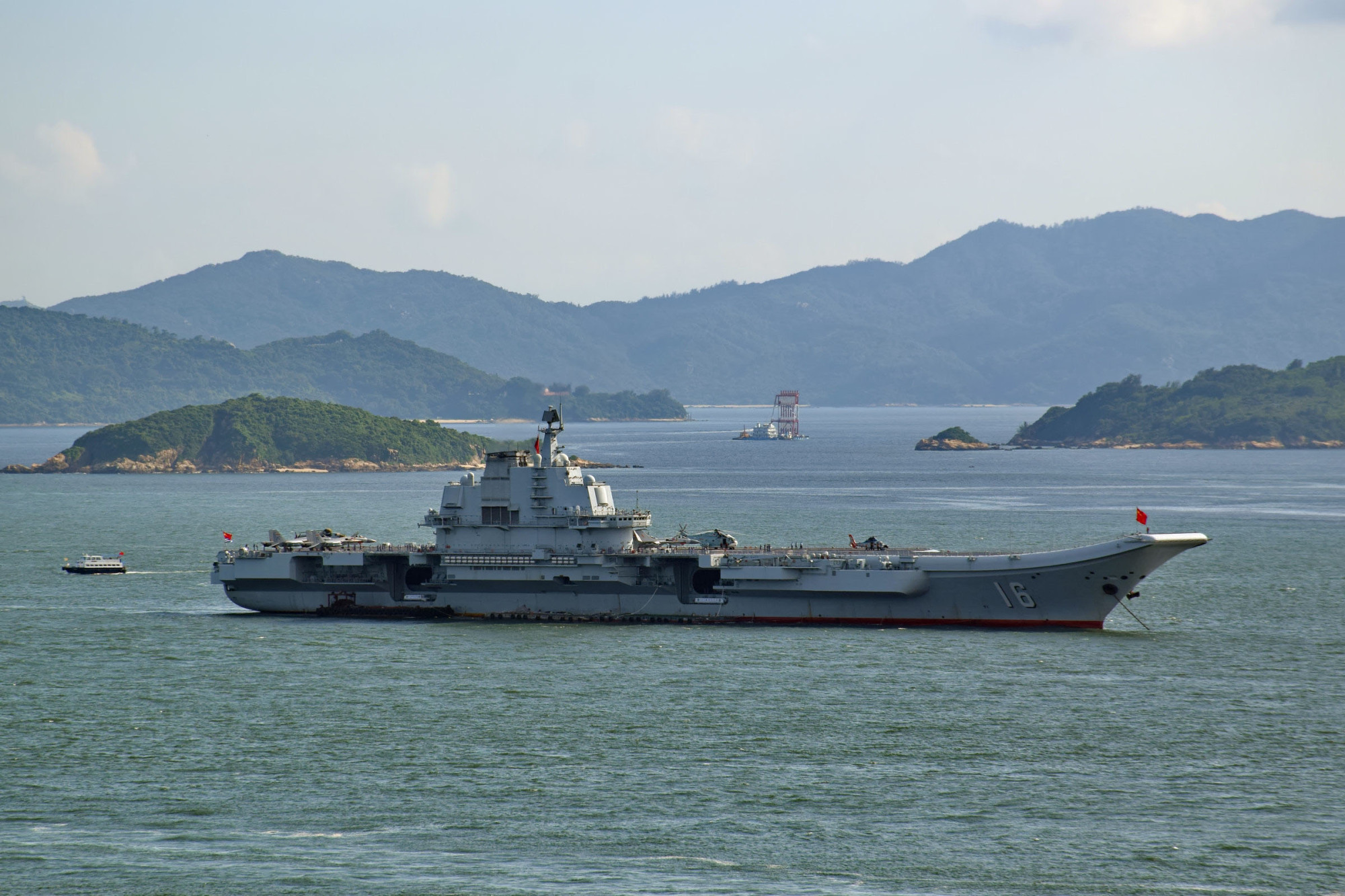 The Liaoning is the Chinese Navy's sole operational aircraft carrier now, but China plans to add three more aircraft carriers to its fleet by 2025 and may also deploy three amphibious assault ships capable of carrying combat aircraft. | BAYCREST VIA WIKIMEDIA COMMONS / CC-BY-SA-2.5