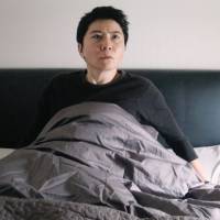 Trial and error: Tsutomu Niwa plays Yosuke Kimura in John Williams\' \"The Trial,\" which puts a Japanese spin on the Franz Kafka novel of the same name. | &#169; CARL VANASSCHE