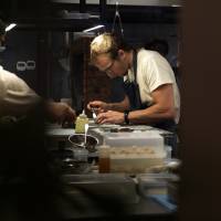 Noma alum: Thomas Frebel, head chef of Inua, prepping in the open kitchen. | JASON LOUCAS