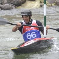 Pyeongchang Paralympic banked slalom champion Gurimu Narita competes in the Japan Cup canoe competition on Sunday in Oshu, Iwate Prefecture. | KYODO
