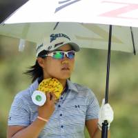 Nasa Hataoka tries to keep cool during the third round of the Women\'s PGA Championship on Saturday in Kildeer, Illinois. | USA TODAY / VIA REUTERS