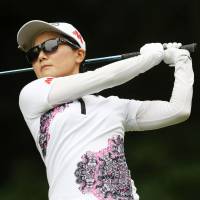 Ayako Uehara follows through on her shot in the first round of the Thornberry Creek LPGA Classic on Thursday in Oneida, Wisconsin. Uehara shot a 7-under 65. | KYODO