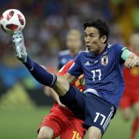 Japan captain Makoto Hasebe controls the ball during his team\'s round-of-16 game against Belgium at the 2018 World Cup in Rostov-on-Don, Russia, on Monday. | AP