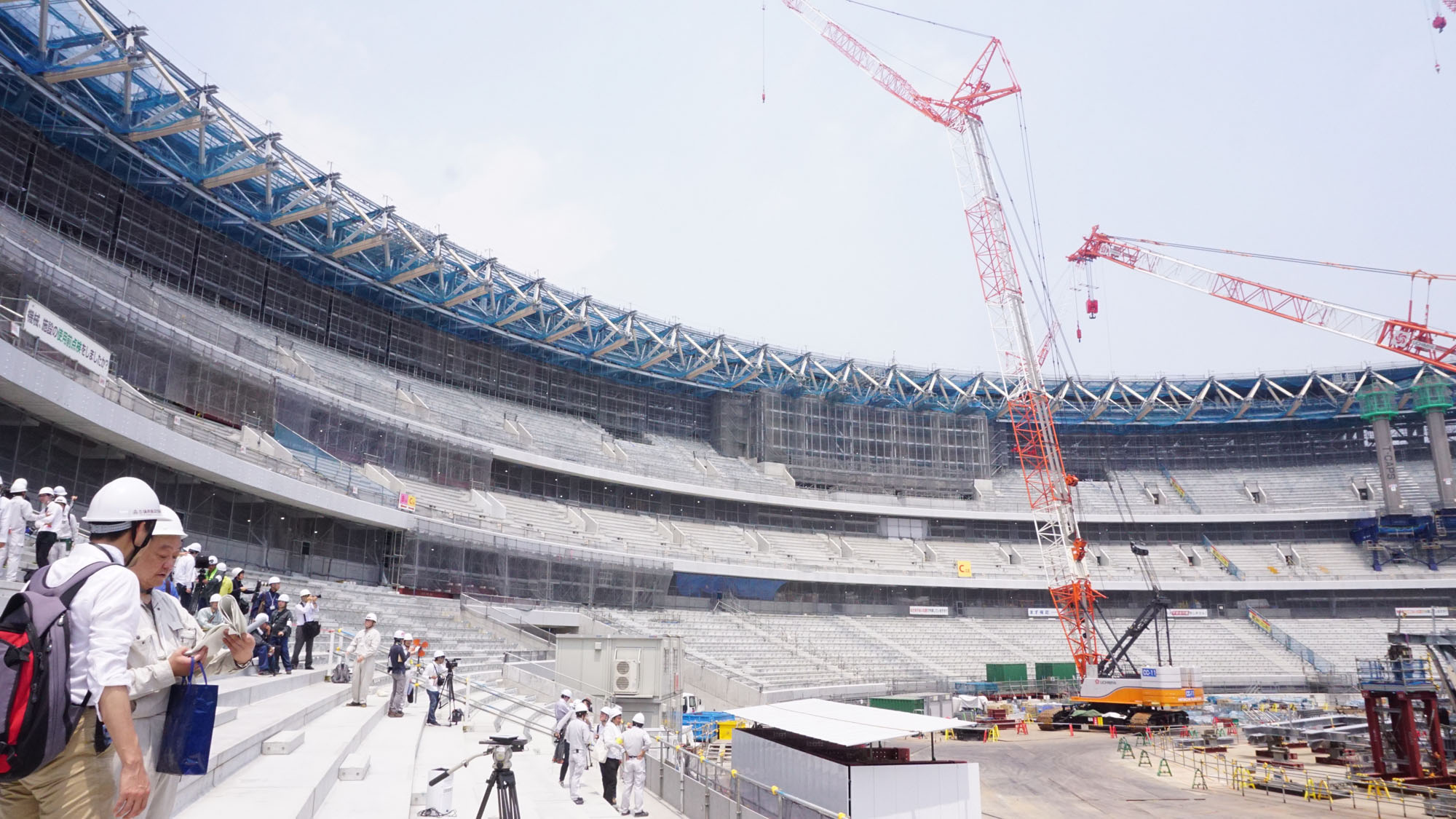 Media members tour the site of the new National Stadium on Wednesday. | MAGDALENA OSUMI