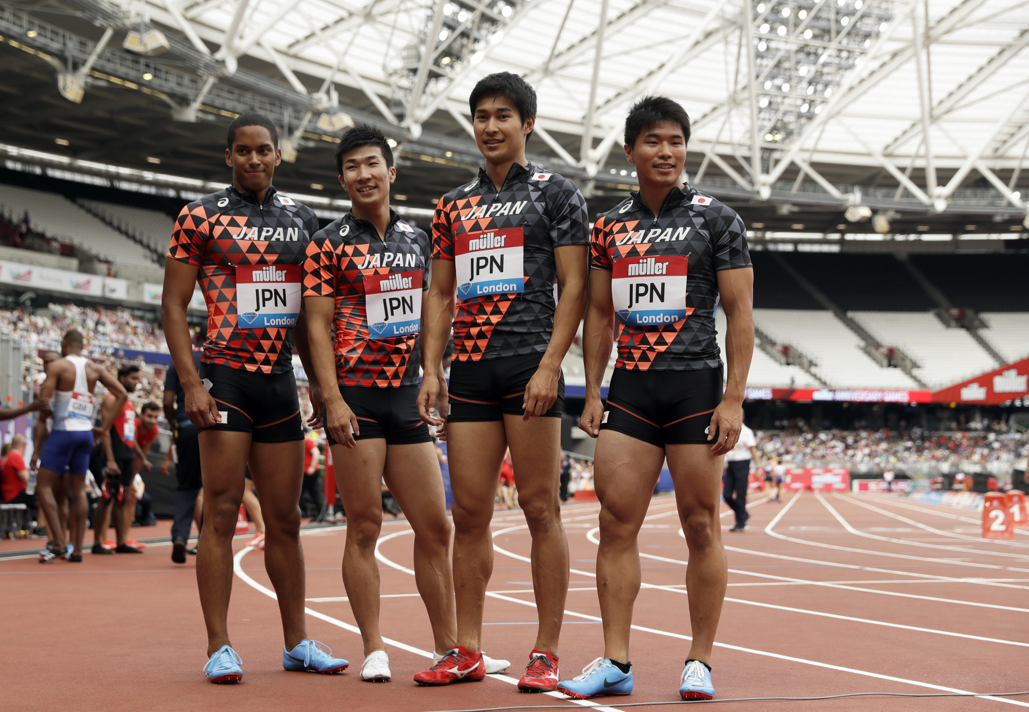 Japan men's 4x100-meter relay members (from left) Aska Cambridge, Yoshihide Kiryu, Shota Iizuka and Yuki Koike are seen on Sunday during the Diamond League meet at London Stadium. | AP