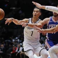 Brooklyn Nets guard Jeremy Lin (left), seen in an October 2017 file photo, is on the verge of being traded to the Atlanta Hawks. | AP