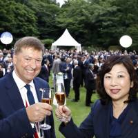 British Ambassador Paul Madden poses for a photo with Seiko Noda, minister for internal affairs and communications, at an event to celebrate the 92nd birthday of Her Majesty Queen Elizabeth II at the British Embassy Tokyo on June 14. | JUN TAKAGI