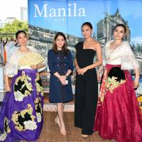 Philippines Department of Tourism Secretary Bernadette Romulo-Puyat (second from left) poses for a photo with 2014 Miss Universe Japan runner-up and Philippines Tourism Ambassador Hiro Nishiuchi (second from right) at a reception at the Ritz-Carlton, Tokyo on June 25. | YOSHIAKI MIURA