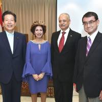 Egyptian Ambassadsor Ayman Kamel (second from right) and his wife, Ghada, pose for a photo with Komeito chief Natsuo Yamaguchi (left) and Foreign Minister Taro Kono (right) during a reception to celebrate Egypt\'s national day at the ambassador\'s residence on July 2. | YOSHIAKI MIURA