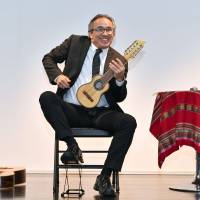 Peruvian composer Alfredo Muro performs at a recital to celebrate Peru\'s national day at the embassy in Tokyo on July 12. | YOSHIAKI MIURA