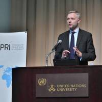 Martin Skancke, chair of the board at the Principles for Responsible Investment, speaks at a symposium at the United Nations University in Tokyo on June 25. | YOSHIAKI MIURA