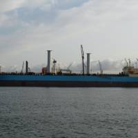 The product tanker vessel Maersk Pelican, with two 30-meter-tall rotor sails, is seen docked at the Netherlands port of Rotterdam on Thursday. | REUTERS