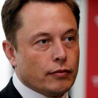Tesla Motors Inc. Chief Executive Elon Musk holds a news conference in Tokyo in September 2014. | REUTERS