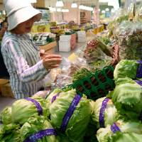 Households spent less for the fifth straight month in June, the government said Tuesday. | BLOOMBERG