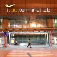 A man walks in front of Budapest Airport\'s terminal 2B Wednesday after one terminal of the airport and its surroundings were briefly shut down as the Disaster Management Authority ordered an investigation due to an overheated container carrying an isotope on an incoming flight. | REUTERS