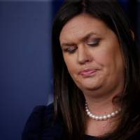 White House Press Secretary Sarah Sanders holds the daily briefing at the White House in Washington Wednesday. | LEAH MILLIS / VIA REUTERS