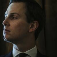 Jared Kushner, senior White House adviser, listens during a meeting with U.S. President Donald Trump (not pictured) in the Cabinet Room of the White House in Washington on Thursday. | BLOOMBERG