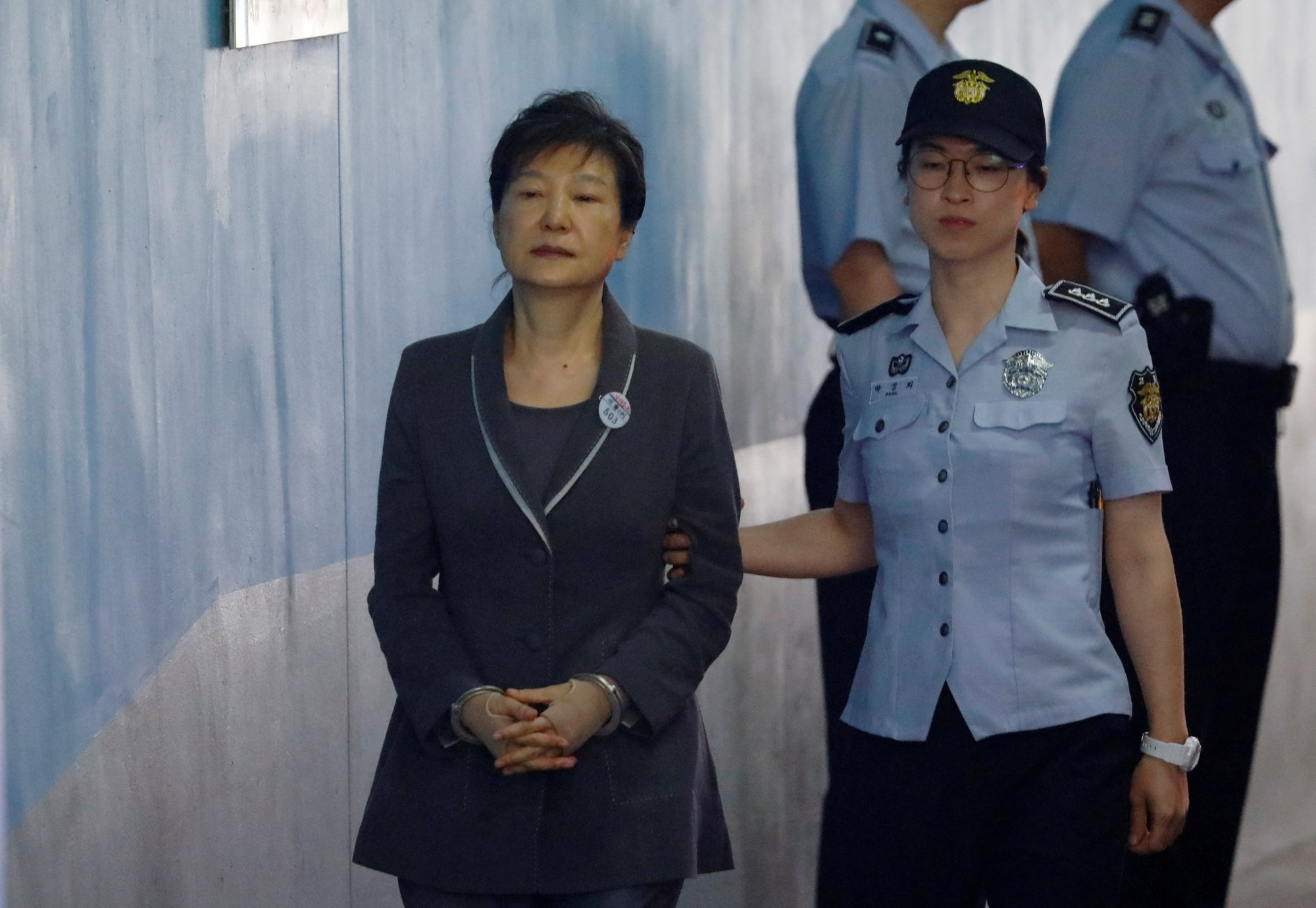 Ousted South Korean President Park Geun-hye arrives at a court in Seoul in August 2017. | REUTERS