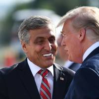 Republican Senate candidate Lou Barletta (left) greets U.S .President Donald Trump upon arrival at Wilkes-Barre/Scranton International Airport in Avoca, Pennsylvania, Thursday. | AFP-JIJI