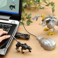 USB sticks and mouses transform into \'giant\' robots | RED) VS. NUMA GIRL (BLUE