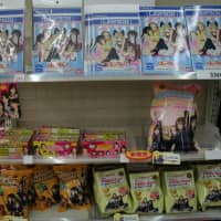 K-On! goods displayed in Lawson convenience store | CENTER) AND CAPTAIN HOMARE SAWA (CENTER RIGHT), SHOW OFF THEIR WOMEN\'S WORLD CUP TROPHIES. (KYODO PHOTO
