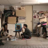 Graphic designer Ben Mori at work in his garage studio. (Photo by Hiro Ikematsu) | PHOTO BY HIRO IKEMATSU