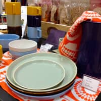 Hasami ceramics, with House Industries x Hasami tea towels. | AP