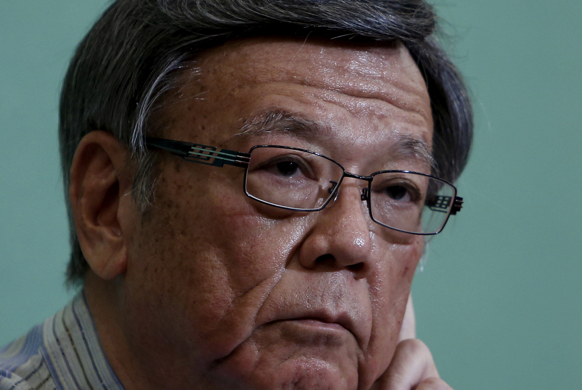 Okinawa Gov. Takeshi Onaga speaks in Tokyo on May 20. | REUTERS