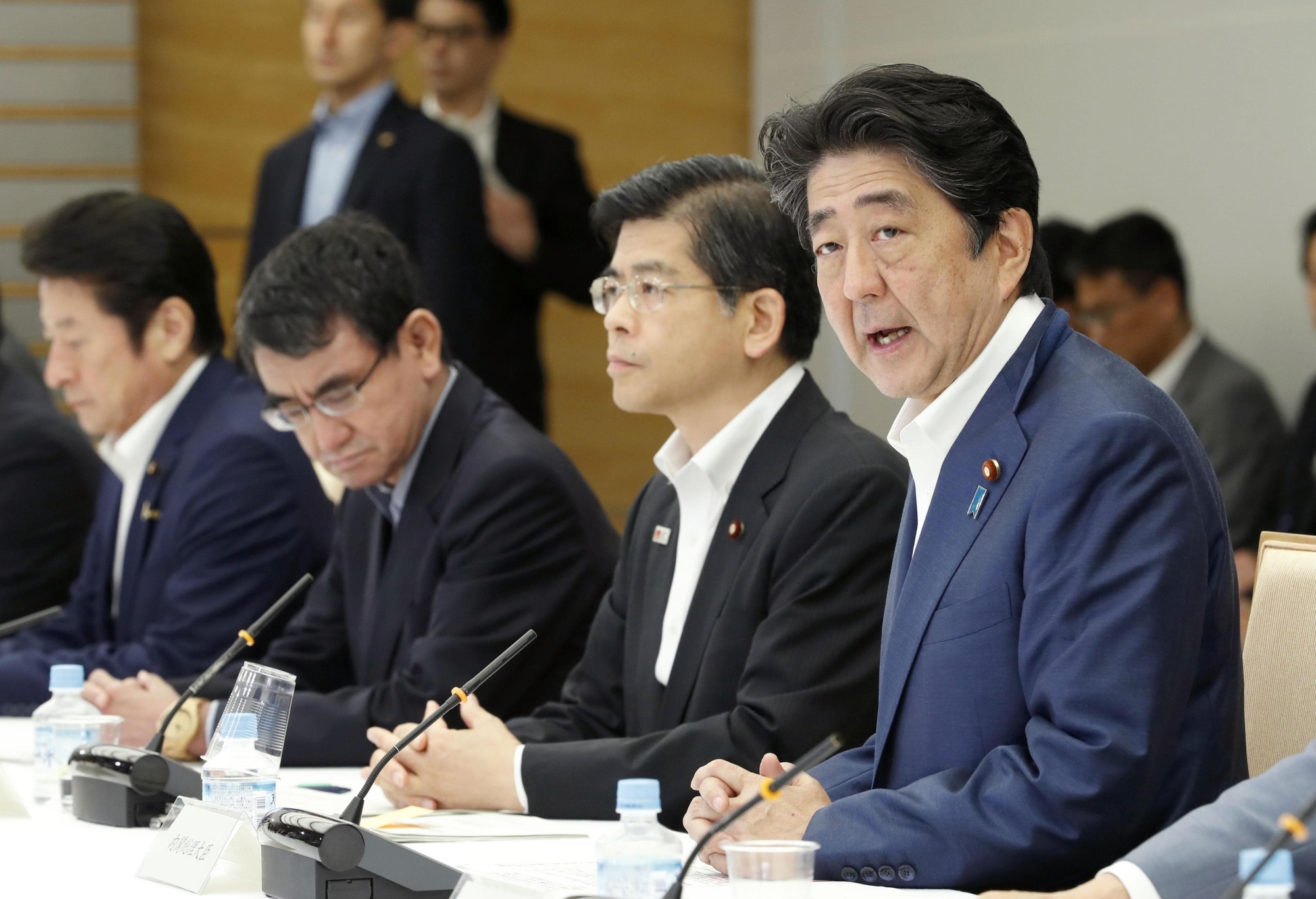 Prime Minister Shinzo Abe speaks during a Cabinet meeting on tourism at his office on Friday. | KYODO