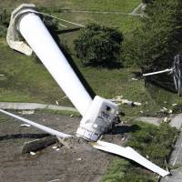 A wind turbine in a park on Awaji Island in Hyogo Prefecture was found lying on the ground Friday morning after Typhoon Cimaron passed over western Japan. | KYODO