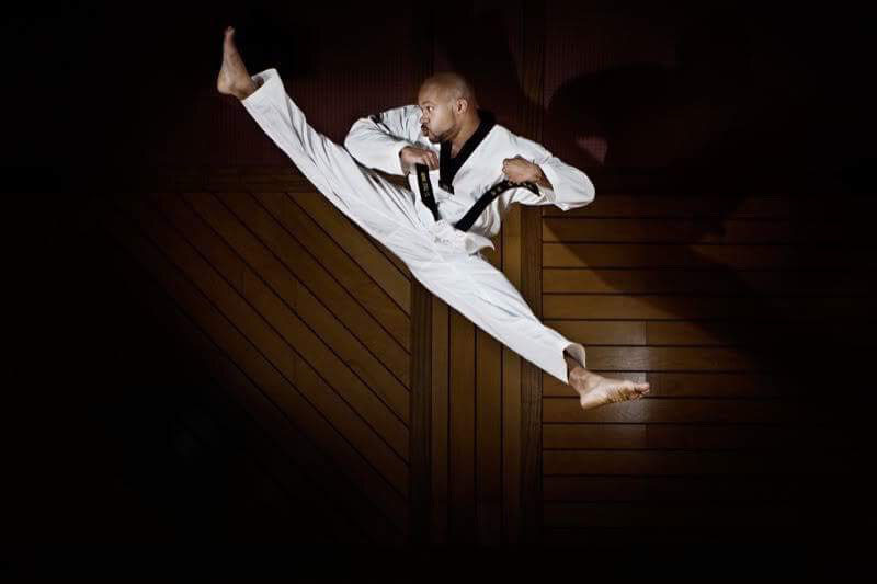 High flyer:  Chuck Johnson's first stop in Asia was South Korea, where he aimed to raise his taekwondo skills to the Olympic level. | COURTESY OF CHUCK JOHNSON