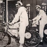 U.S. Navy personnel ride an early version of Honda’s “Cub” around 1952. | MARK SCHREIBER