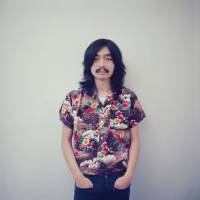 Haruomi Hosono poses for a picture in Sayama, Saitama Prefecture, in 1973. That same year Hosono released his debut solo album \"Hosono House.\" | COURTESY OF MIKE NOGAMI/ VIA LIGHT IN THE ATTIC