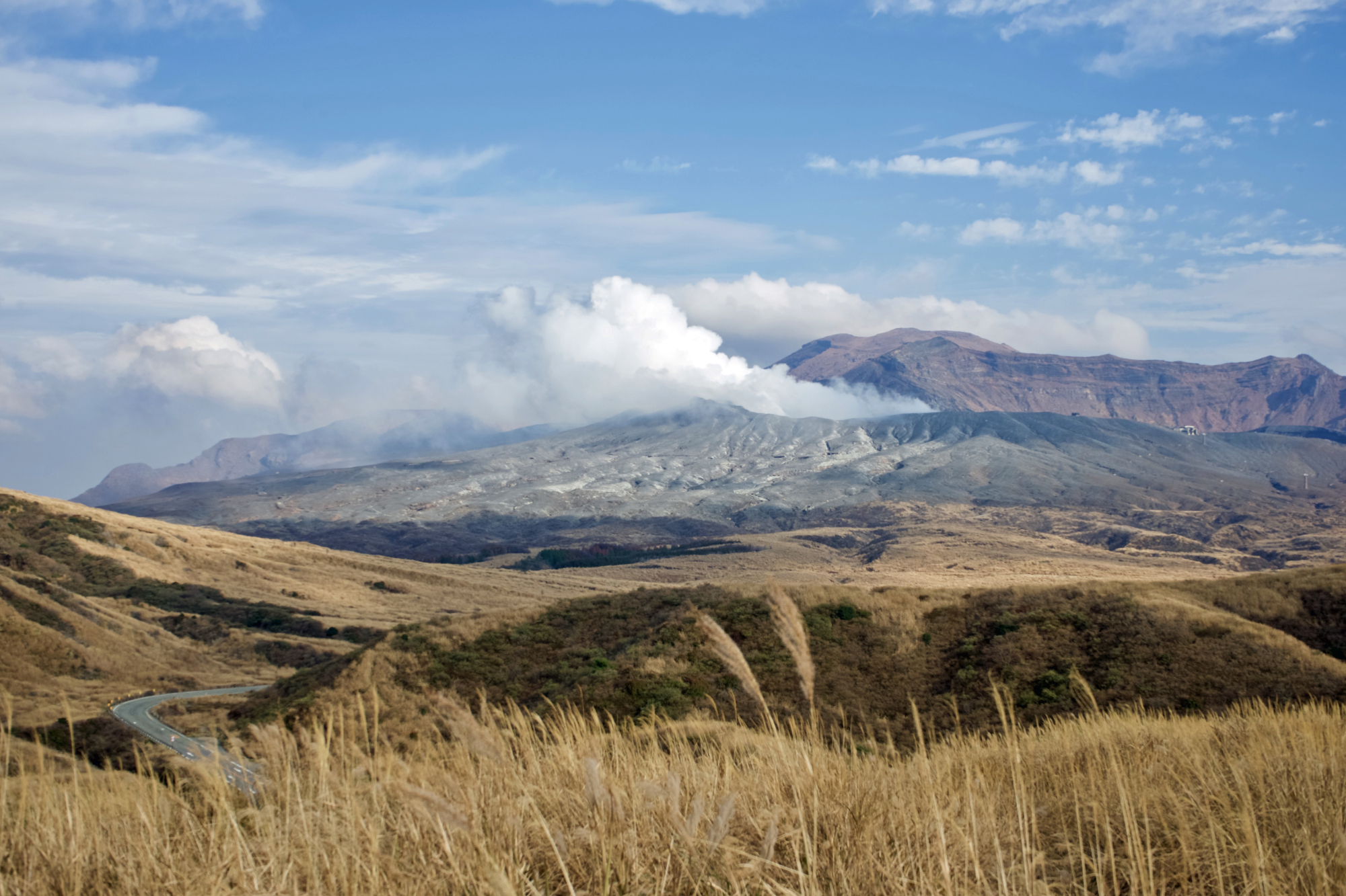 Fit for a villain: The smoking crater and volcanic landscape of Mount Aso, Kumamoto Prefecture, which features in the James Bond novel 'You Only Live Twice.' | OSCAR BOYD