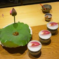 Lotus line-up: Masato Miyazawa\'s artful combination of junsai (watershield) and dashi in a lotus leaf with individual servings in lotus flower petals. | J.J. O\'DONOGHUE