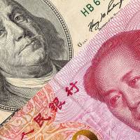 Is the Chinese currency rising on the world stage? Don\'t bet on it, many economists warn. | GETTY IMAGES