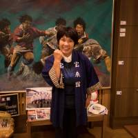 Akiko Iwasaki, the landlady of the Horaikan inn, was almost swept out to the sea by the tsunami but survived by clinging onto the inn\'s minibus. | AFP-JIJI
