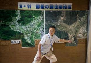 Kamaishi Higashi Junior High School Principal Kenji Sasaki explains the damage caused by the tsunami that follwed the 2011 Great East Japan Earthquake.